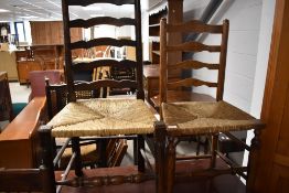 Two (not a pair) of 19th Century ladder back chairs having rush seats