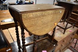 An early 20th Century oak twist gate leg table (af)