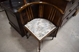 An Edwardian mahogany corner bedroom chair