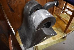An antique metal horn, probably from gramophone or factory address system