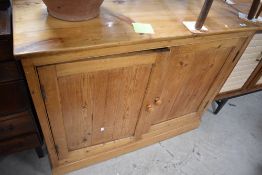 A Victorian pine side cabinet, dimensions approx. W113 H93 D46cm