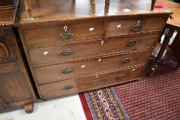 A Victorian mahogany chest of two short over three long drawers having bone escutcheons and brass