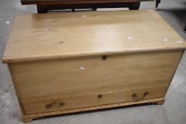 A stripped pine bedding box , having drawer to base, dimensions approx. W120 D57 H62cm