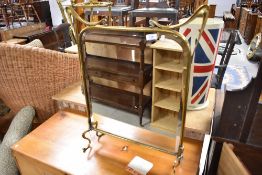 An Art Nouveau brass mirrored fire screen height approx. 65cm