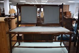 A Victorian mahogany salon settee having turned frame, width approx. 110cm