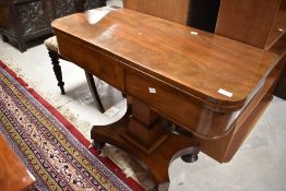 A William IV mahogany fold over card table, width approx. 92cm