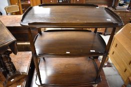 A dark stained Ercol tea trolley