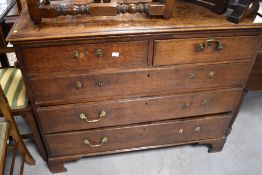 A Georgian oak chest of two over three drawers, dimensions approx. W108cm H88cm D53cm