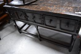 A period oak dresser base having three Jacobean style drawers on turned frame, dimensions approx.