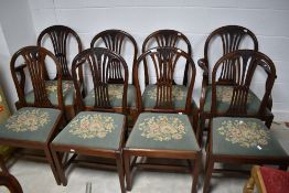 A set of eight (six plus two) mahogany Georgian style dining chairs having wheatsheaf back and