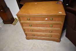 A modern four drawer bedroom chest , dimensions approx. H71 W75 D45cm