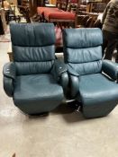 A pair of Himolla electric rise and recline armchairs, finished in teal leather