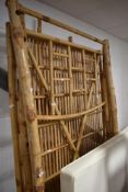 A vintage bamboo bed frame with bespoke mattress, width of mattress, 112cm