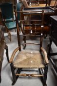 A 19th Century rush seated rocking chair