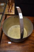 A traditional brass jam pan