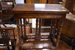 A nice quality reproduction oak (possibly Titchmarsh and Goodwin) fold over occasional table