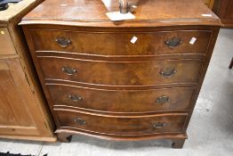 A vintage walnut bedroom chest of three drawers having serpentine front, width approx. 78cm