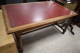A late 19th or early 20th Century oak library table , having inset leather 'skiver' top, approx. 167