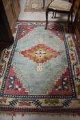 A traditional Turkish style wool rug, approx. 185 x 140cm