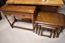 A Priory style side table, height approx 69cm and a similar nest of three tables