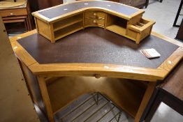 A modern golden oak corner desk, approx. 100 x 100cm