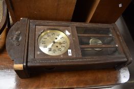 An early 20th Century oak cased wall clock (af)
