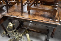 A 19th Century dark oak side table in the refectory style, approx. 105 x 60cm