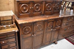 An interesting pine mid 20th Century court cupboard style sideboard , having dark stained , width