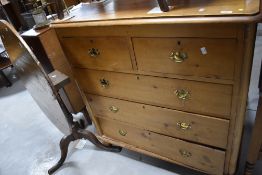 A Victorian stripped chest of two over three drawers having small brass handles, width approx.