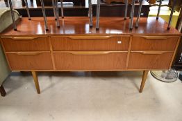 A vintage teak effect sieboard, dimensions approx. H69 W146 D46cm