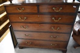 A Georgian mahogany chest of two over four drawers having brass drop handles and bracket feet,