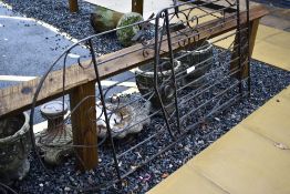 Two wrought iron garden gates