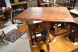 A Victorian mahogany occasional table having rectangular top on naturalistic turned column and