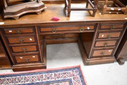 A Victorian mahogany dressing table or desk in the Aesthetic style , dimensions approx. W145 H75