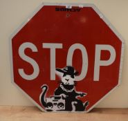 An interesting unauthorised 'BanksyLand' Banksy Retrospective American stop sign, (painted metal