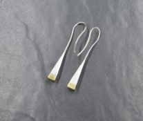 A pair of contemporary 18ct gold two tone earrings, the white gold hook earrings having a tapered