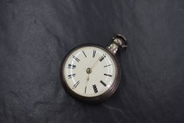 A William IV silver key wound open face pocket watch, the white dial having Roman numerals, in an