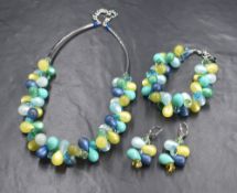 A suite of Coeur De Lion jewellery of teardrop form in tones of green and yellow including necklace,