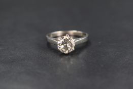 A platinum and diamond solitaire ring, the brilliant cut diamond being approx 2ct in a raised claw