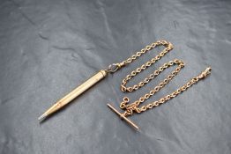 A 9ct rose gold fancy link watch chain with T bar and attached rolled gold chatalaine pencil,