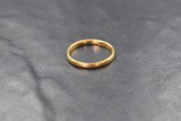 A 22ct gold wedding band of narrow form, size M/N & 2.5g