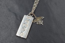 A 1977 silver ingot pendant on a silver 22' belcher link chain, approx 27g