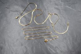 A 9ct gold snake link neck chain with a matching bracelet, marked 375 and 9KT, along with a 9ct gold