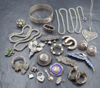 A selection of silver & white metal jewellery including brooches, earrings, suffragette brooch,