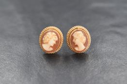 A pair of 9ct gold cameo stud earrings of traditional form, 3g gross