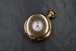 A 9ct gold Elgin top wound hunter pocket watch, the white dial having Roman numerals and