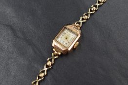 A ladies vintage 9ct rose gold wrist watch by Russell having an Arabic numeral dial to a square face