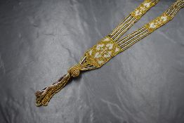 A belle epoque beaded sautoir necklace having gold and silver coloured metal beaded strands
