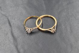 Two yellow metal ring shanks, both stamped 18ct /plat, both missing all stones, approx 4.6g