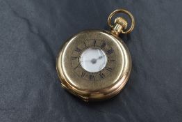A gold plated top wound full hunter Waltham pocket watch, the case having Roman numerals and window,